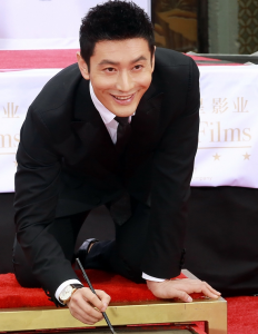 Huang Xiaoming With Male Rose Gold Hands Tissot Chemin Des Tourelles Powermatic 80 COSC Copy Watches