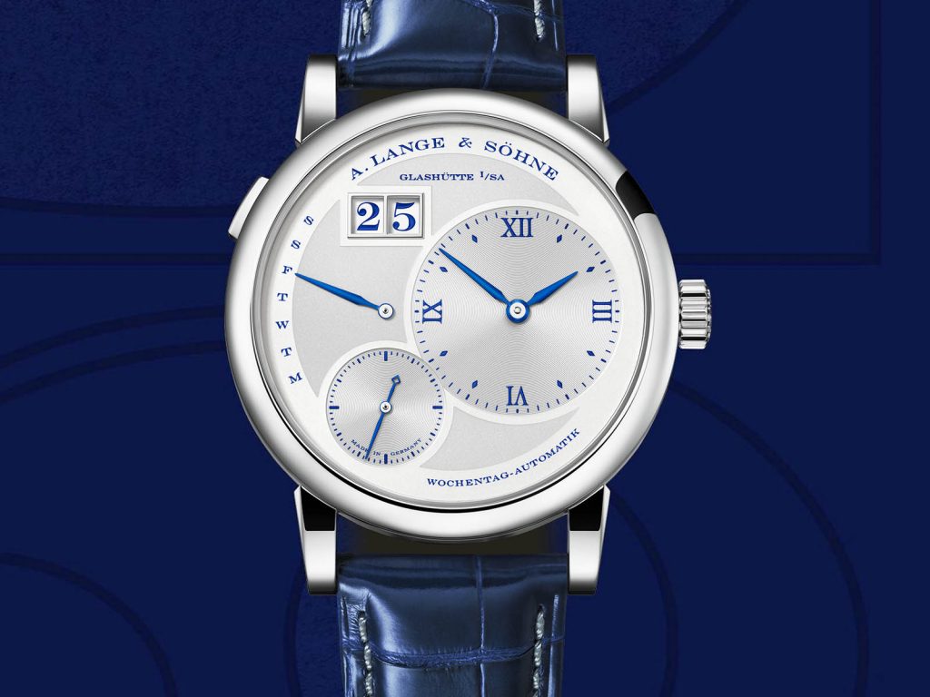 The 18k white gold fake watch has blue strap.