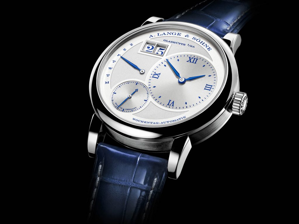 The silvery dial fake watch is designed for men.